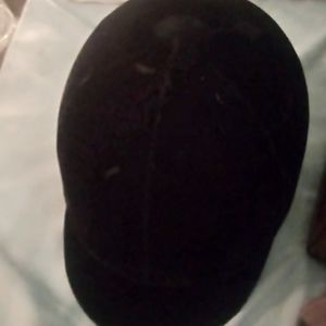 Women's horse riding helmet.